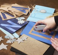 Use handmade stencils to make your own greeting cards.