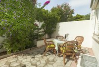 Small patio with shared wall.