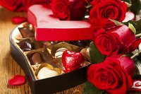 Roses and heart shaped chocolates.