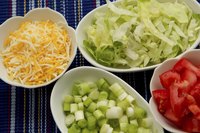 Offer shredded lettuce as a topping for any build-your-own meal.