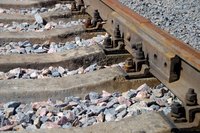 A close up of railroad ties.