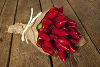 Tie a bunch of peppers with twine and hang them for two months to dry.