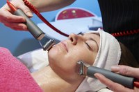 Faradic facial treatments use electric currents to firm facial muscles.