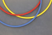 Hula-hoops ready to be painted black.