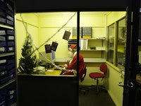 Man dressed as Santa in office