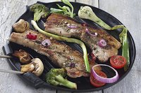 Pair fresh vegetables with pork belly to balance the richness.