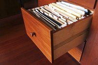 Image of records in a file cabinet.