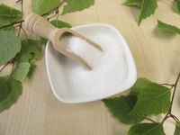 Small bowl of saccharin on table