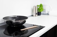 Some types of wok will work on a high-end induction stovetop.