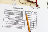 An overhead view of a performance evaluation form on a desk.