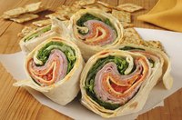 Slice wraps just before serving to keep them fresh longer.