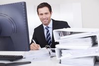 Business accountant working at desk