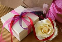 Organza fabric and ribbons are used for multiple craft projects.