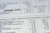 A close-up of figures on a payroll stub.