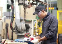 An industrial engineer working in a plant.
