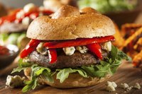 Blue cheese and red peppers add extra flavor to a portabella burger.