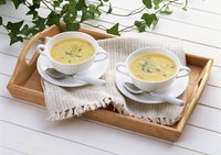 Serve cream of chicken soup with fresh bread or a baguette.