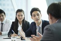 Employees listening in during meeting