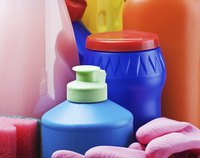Close-up of cleaning products and rubber gloves.