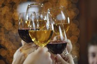 Toasting with glasses of wine.