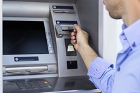 Man using the ATM.