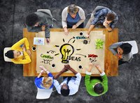 A team is coming up with a catchy marketing design.
