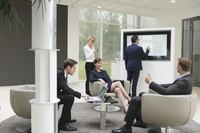 Business employees sitting around.