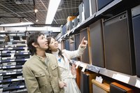Young couple shopping in an electronics store