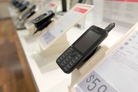 Electronic devices on display in a retail store.