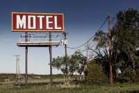 A sign for a rural motel.