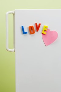 Don't forget to add embellishments to your refrigerator costume, such as magnets, grocery lists and cereal boxes on top.