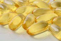 A close-up of fish oil capsules.