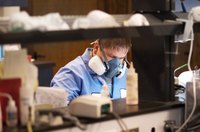 A laboratory requires a variety of skilled professionals to analyze samples.