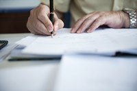 Adult male signs contract