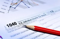 Income tax return form and pencil