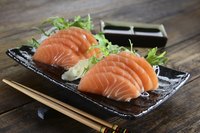 Plate of sliced salmon pieces
