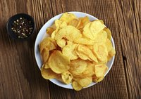 Small plate filled with potato chips.