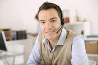 A portrait of an agent on the phone at his desk.