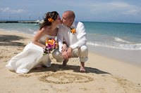 Leave the details such as flowers and cake up to a hotel wedding planner in Jamaica.