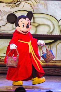 Mickey Mouse entertains visitors at all five global Disney resorts.