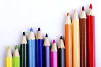 Colored pencils tint your shrink-art creations before baking.