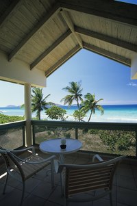 A roofed porch lets you enjoy the shade on a sunny day.