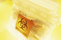 A biohazard waste label on a box.