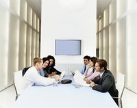 Business leaders are in a meeting.