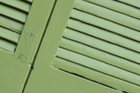 Hinged shutters can enclose a porch when necessary.