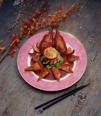 The sweet and sour flavor of duck sauce pairs well with Peking duck.