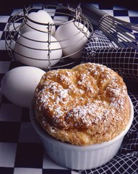 Acids, such as cream of tartar, help stiffen egg whites in soufflé.