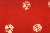 Set red dye with fixative and salt.