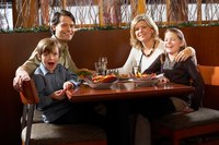 Many restaurants have a "kids eat free" night.