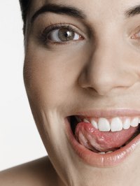 Oil pulling removes toxins and bacteria to give you shiny, healthy teeth.